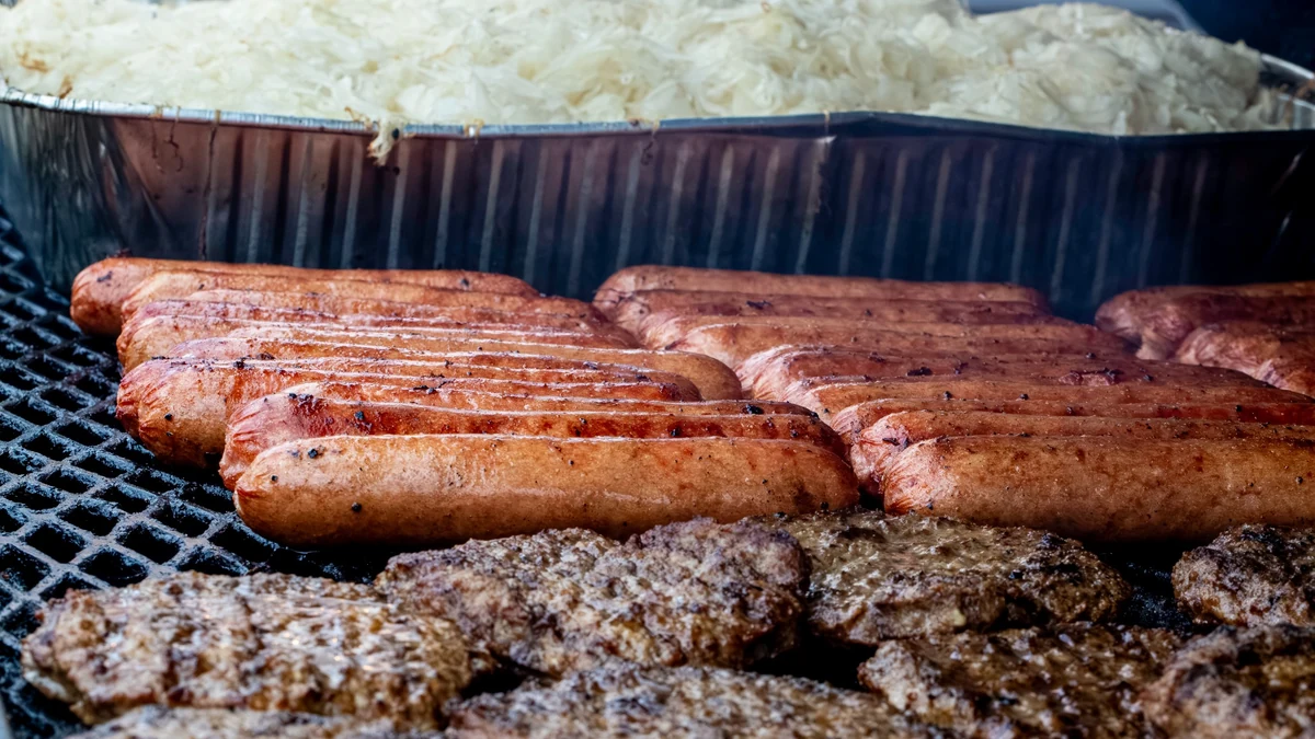 Grilled sausages, burgers, and sauerkraut for Oktoberfest food service