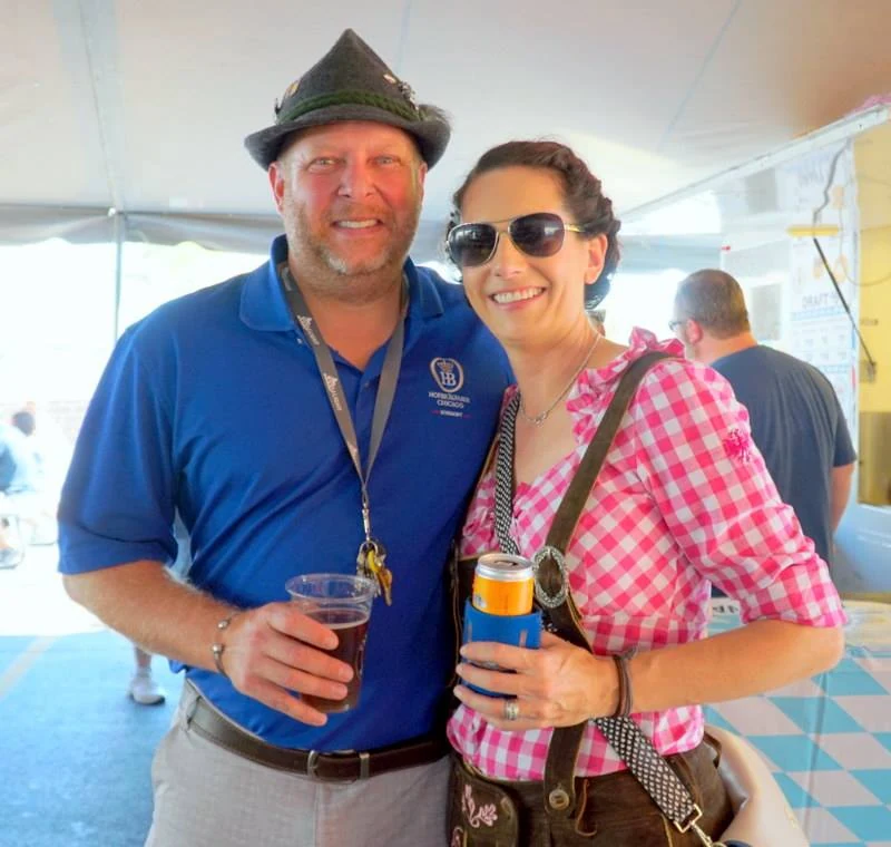 Two parish friends smiling together at Oktoberfest