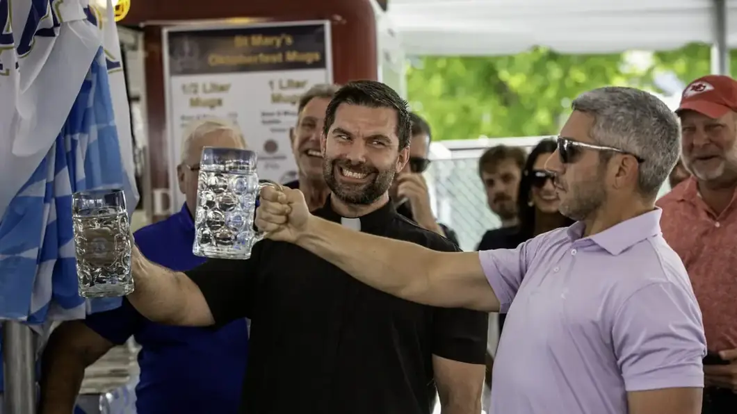 A toast at the St. Mary’s Oktoberfest keg tapping