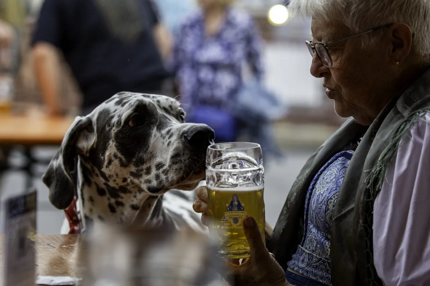 Couple smiling together in Oktoberfest hats