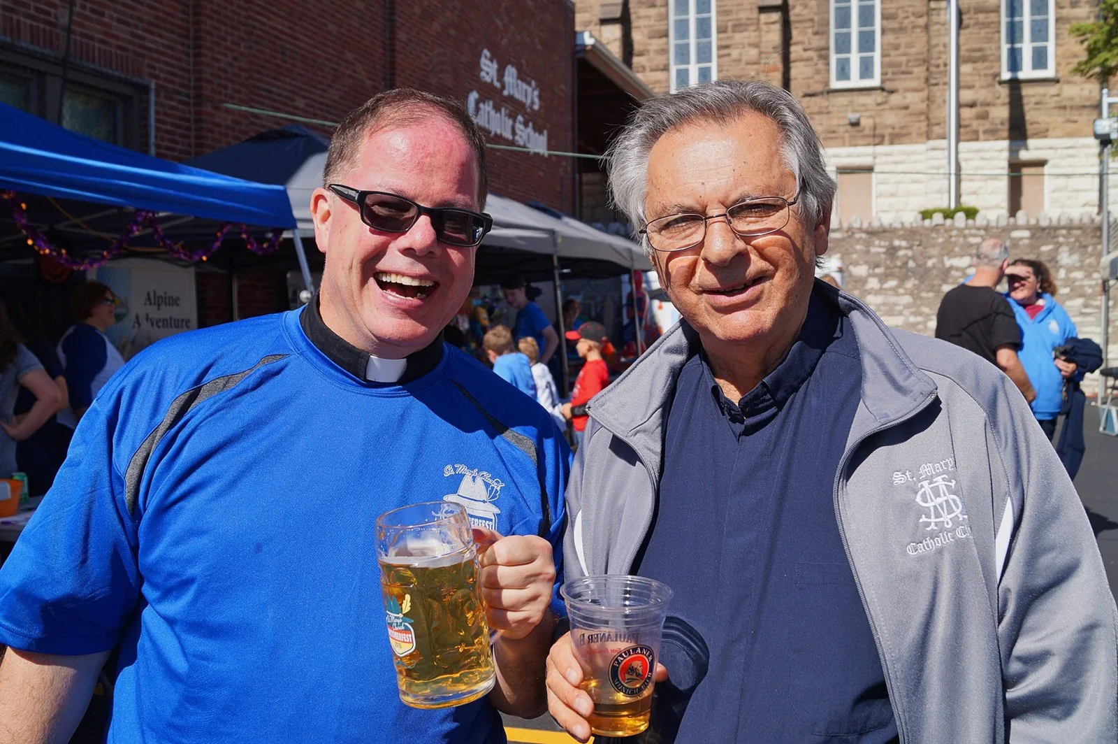 Fr. Jim Walther with a guest at Oktoberfest