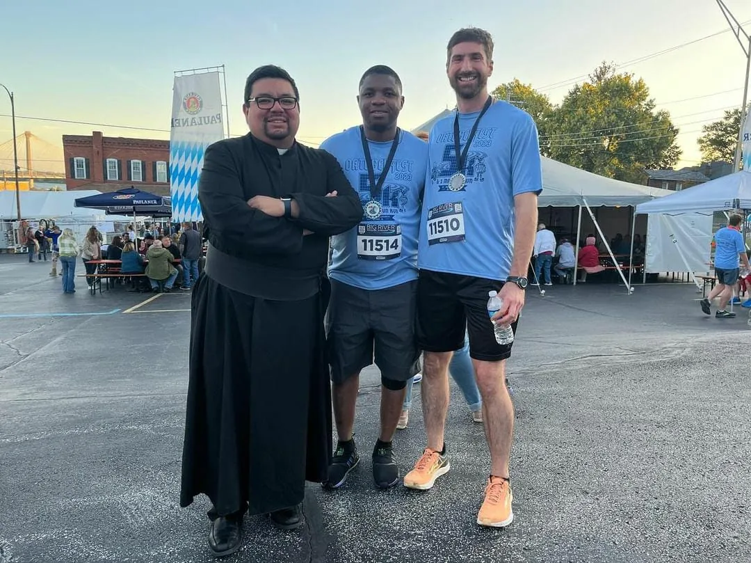 Fr. Nathan Marzonie with Oktoberfest race participants