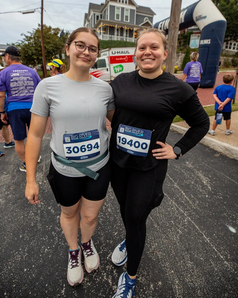 Race friends smiling after the Oktoberfest run